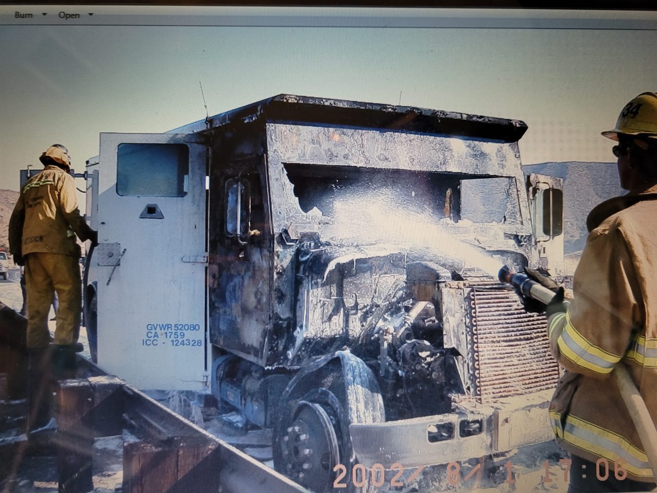 Overhaul of the cab and engine compartment after a vehicle fire, August 2002